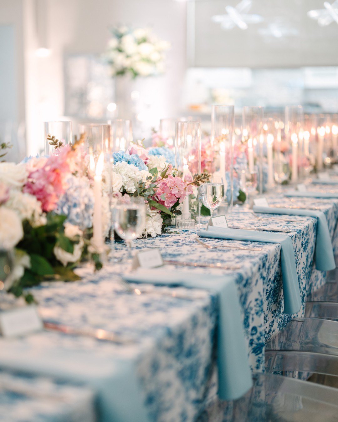 Lush florals, playful patterns, and a breathtaking hanging installation that left everyone in awe.

Planning &amp; Design - @weddingsbystardust
Acrylic Signage - @huskyhousedesignco
Bakery - @thelondonbaker
Bar - @coladainc 
Beauty - @the_styling_ste