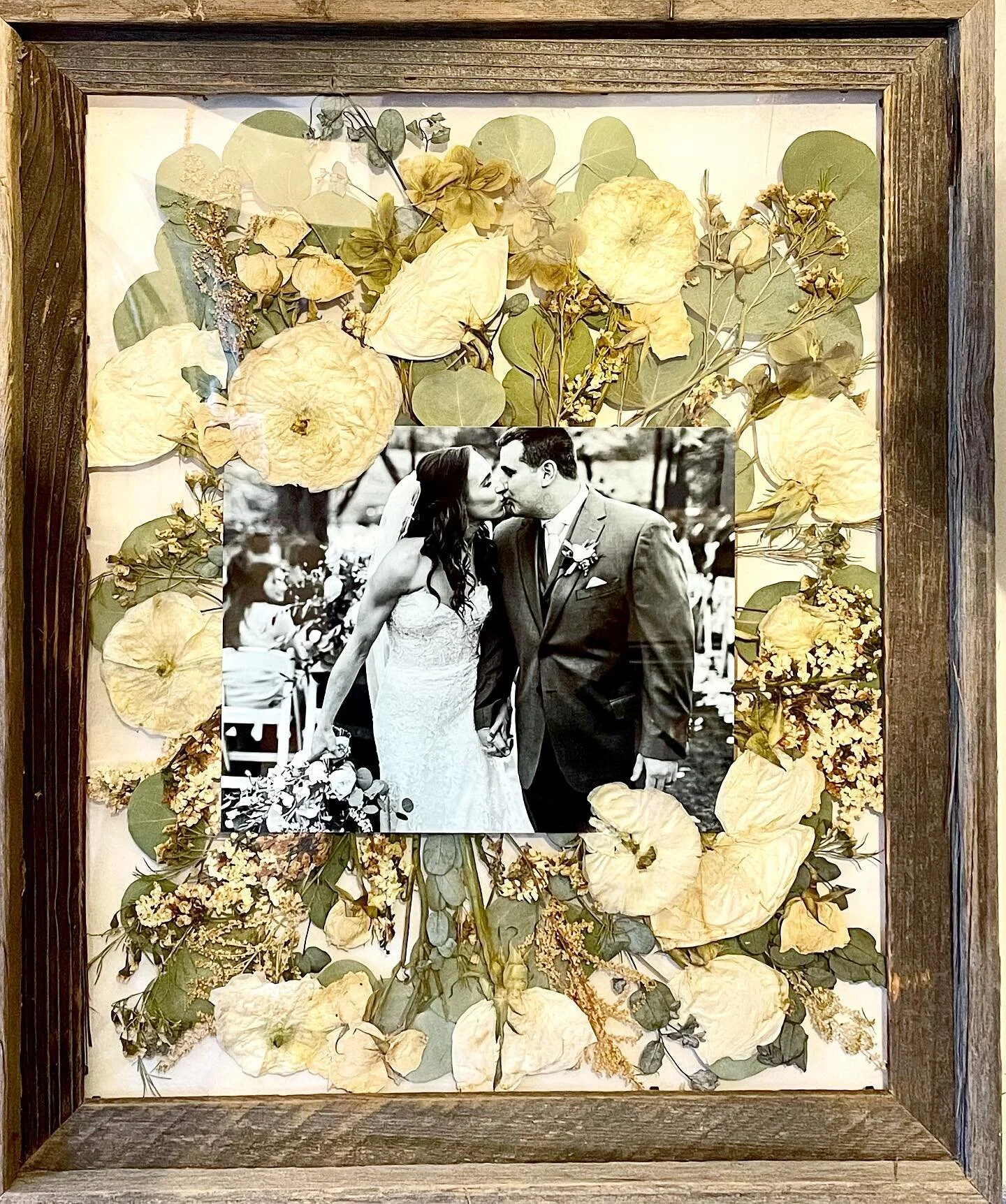 Loved this black and white photo paired with an all white wedding bouquet! Seriously timeless! 
This was a gift to the bride from the bridesmaids who were also so thoughtful to have flowers preserved for the mother of the bride as well! Stay tuned fo