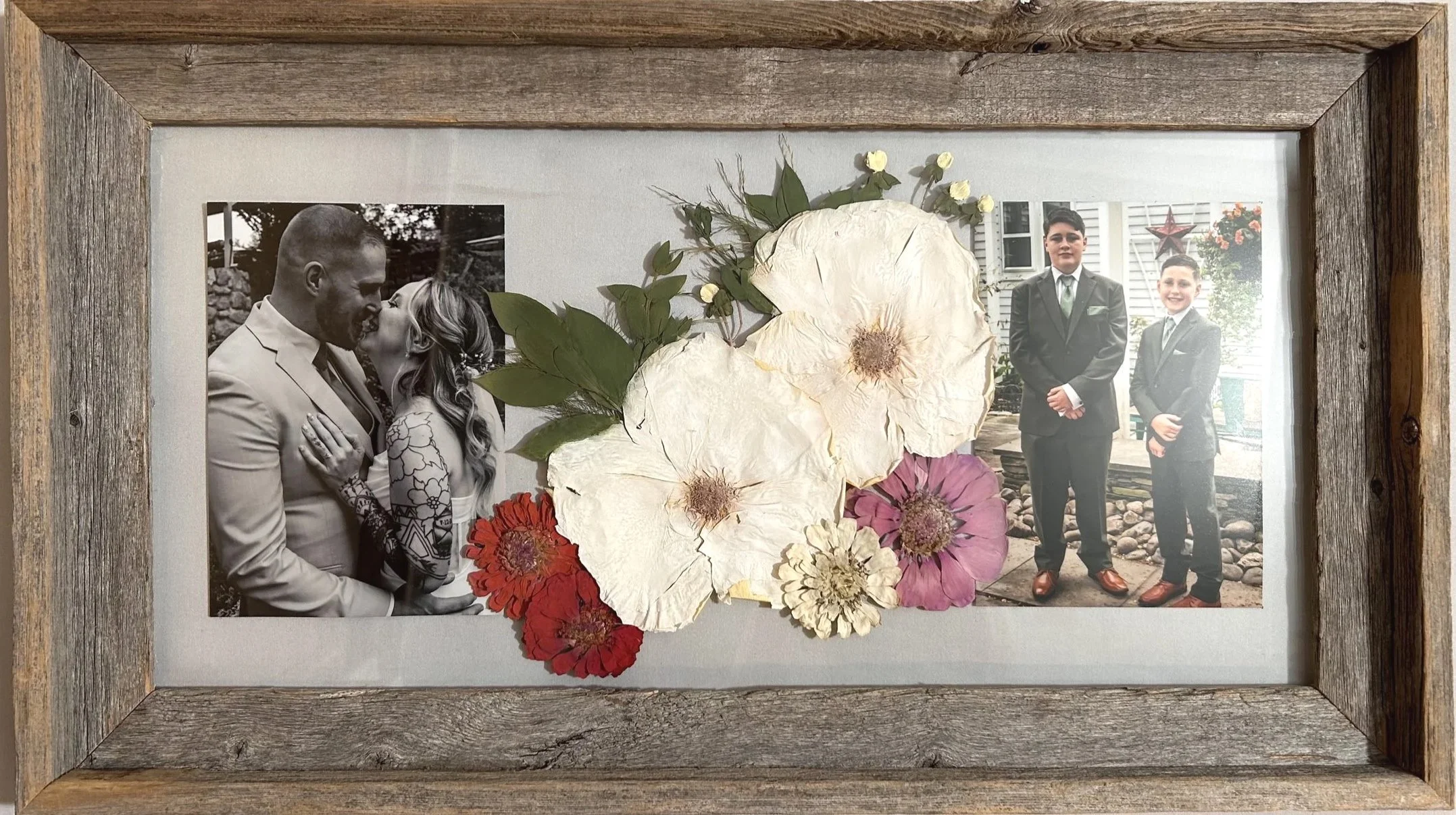 10x20 barn wood with (2) 5x7 photos, children's boutonnières, and zinnias grown by the bride's father from center pieces, color corrected