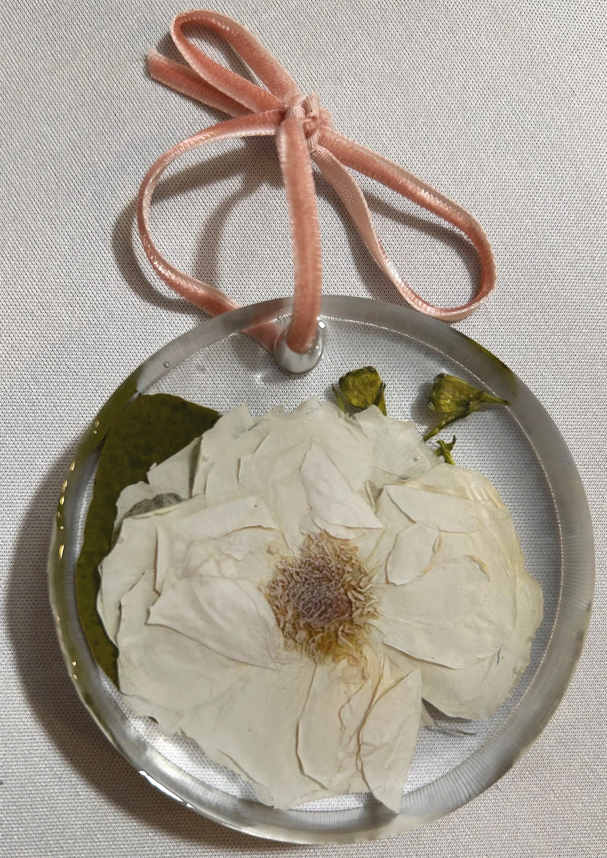 3" resin ornament featuring mini spray rose, color corrected