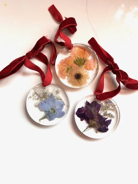Mini 2.33" resin ornaments featuring the smallest blooms from your bouquet.