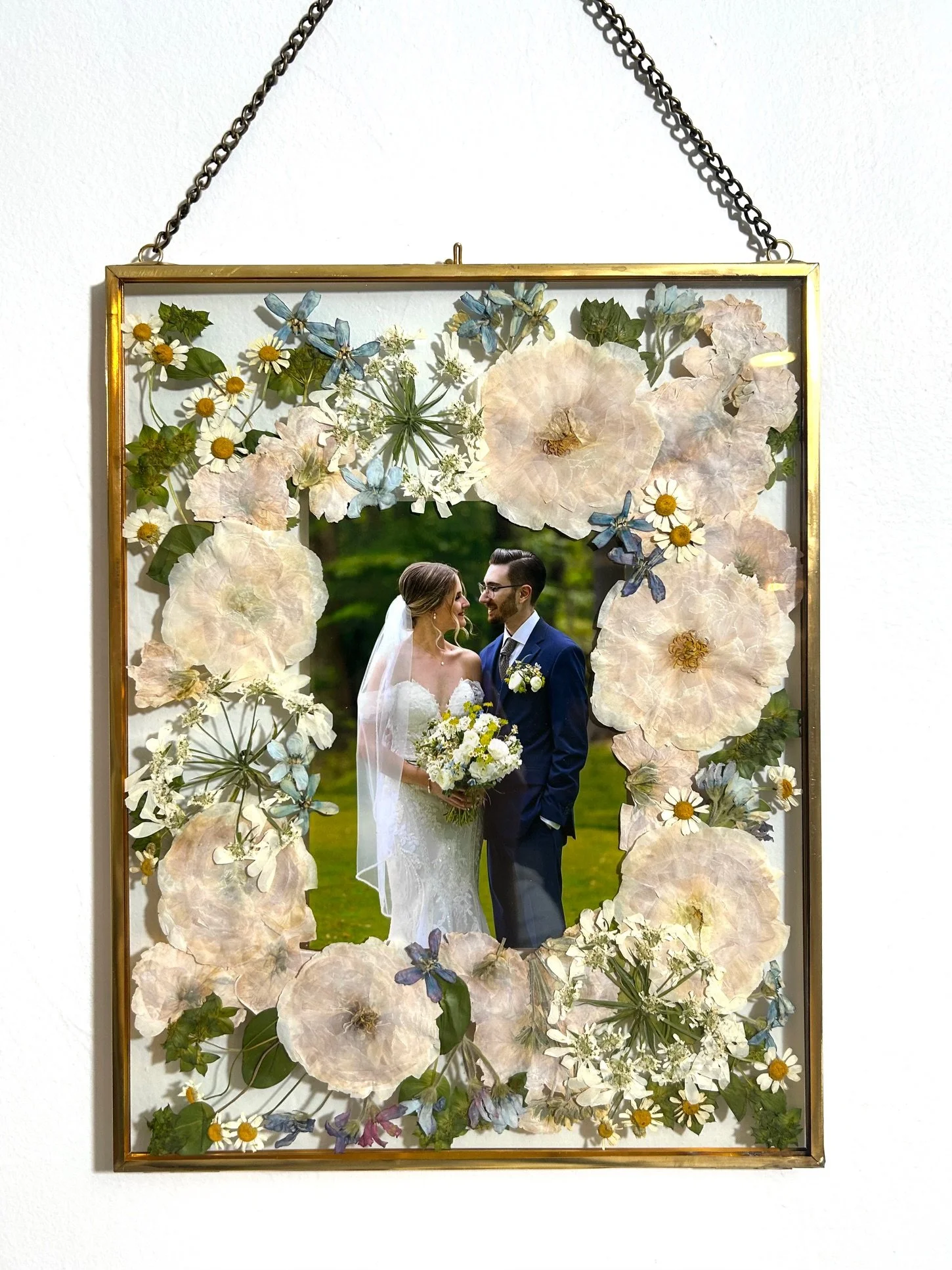 11x14 vintage inspired hanging gold frame with chain featuring 5x7 photo and color corrected white ranunculus, stock.