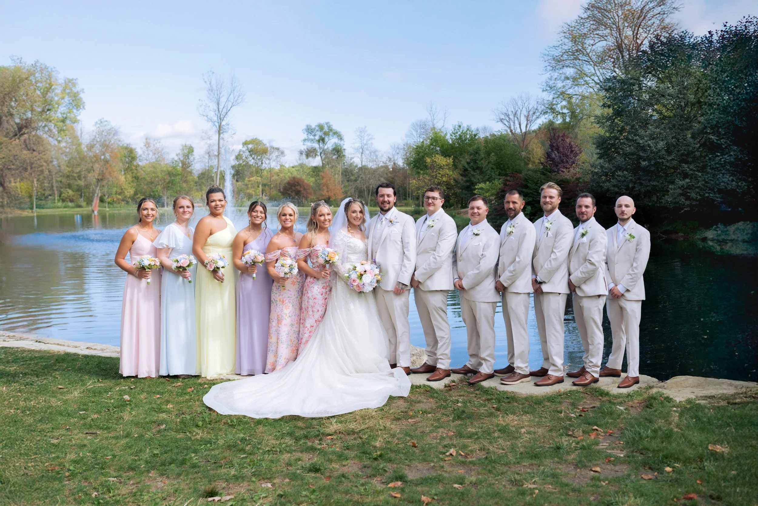 Photo of a bridal party in front a pond in Sterling Heights, Michigan. 