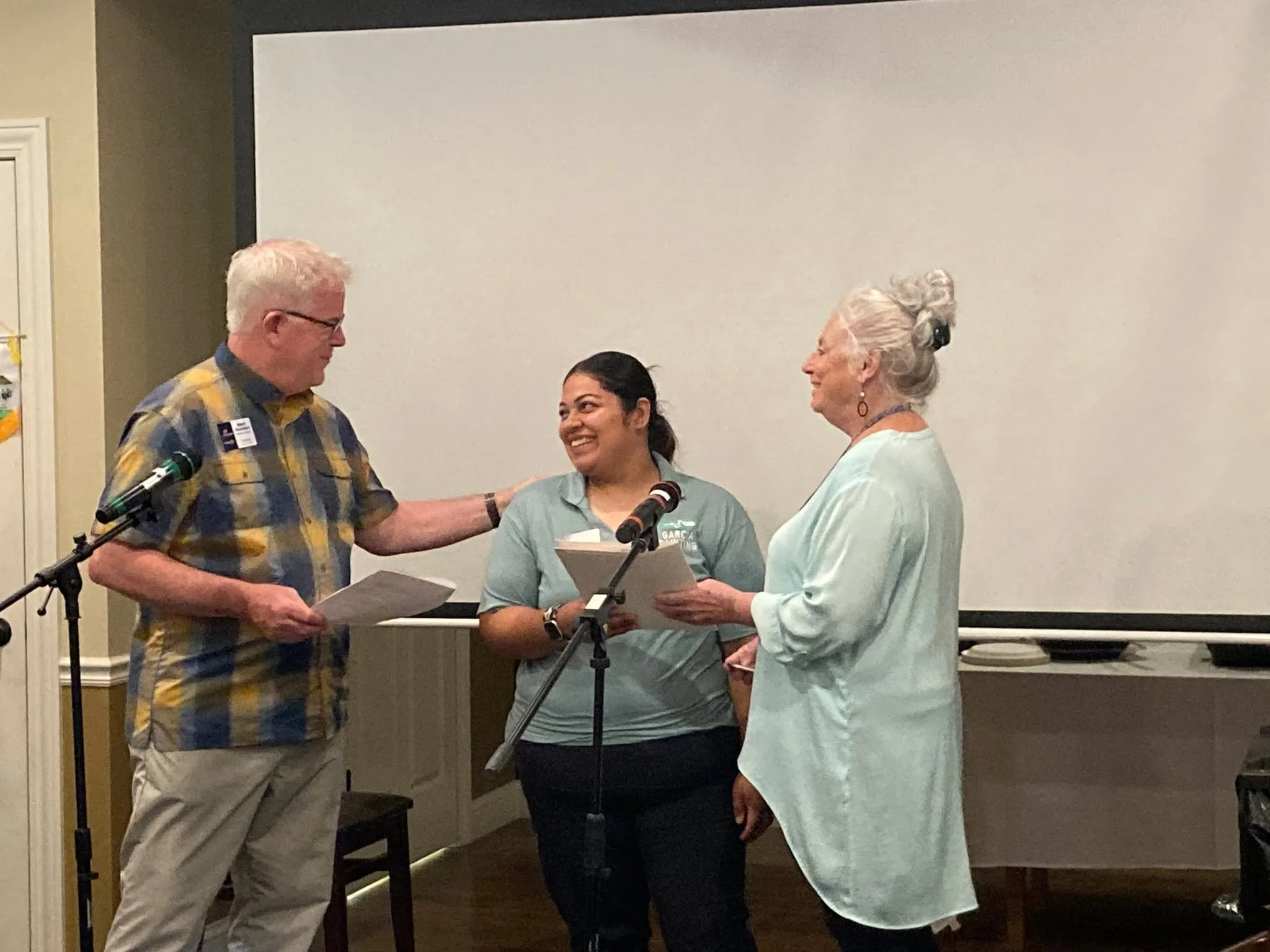 Today our club celebrated the induction of new member Jessica Garcia - welcome, Jessica! Jessica is pictured in the center, with her club sponsor Mark Ruggeberg on the left and club mentor Deb Dunkhase on the right. 

We were also fortunate to hear f