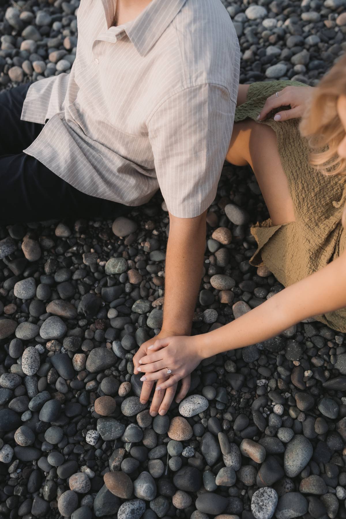 Engagement ring detail photo on beach stones during Parksville engagement session