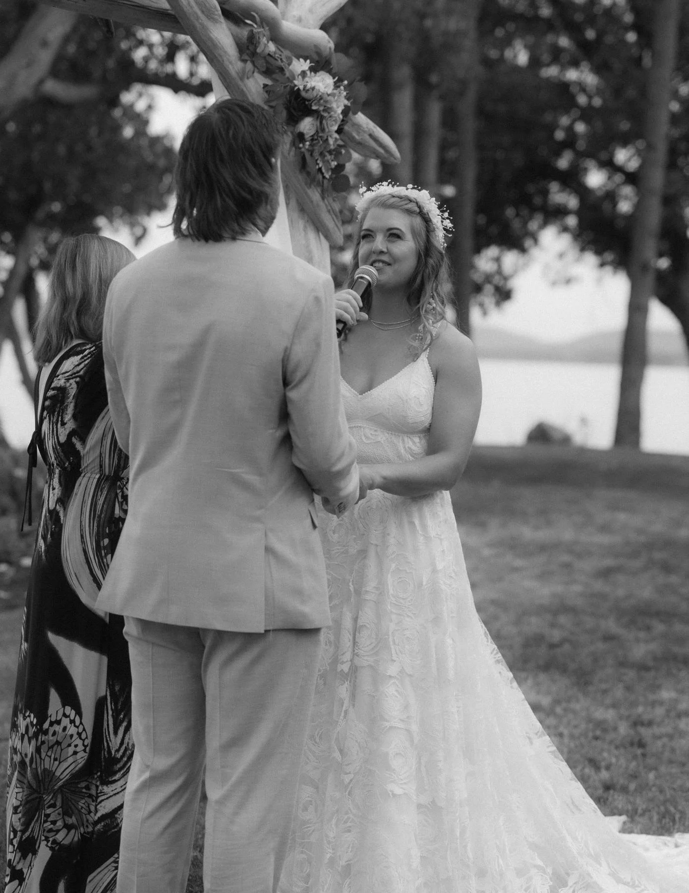 Bride reading her vows during an oceanfront wedding ceremony near Parksville on Vancouver Island