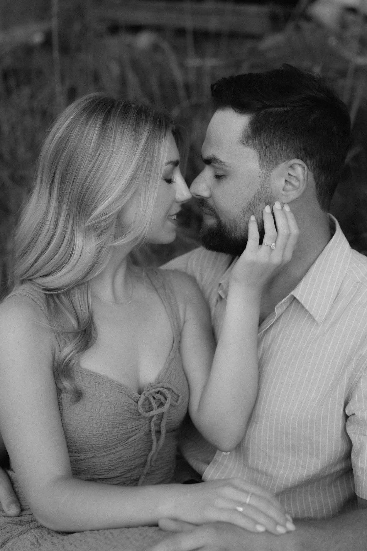 Romantic engagement portrait of a couple near the ocean in Qualicum Beach near Parksville on Vancouver Island