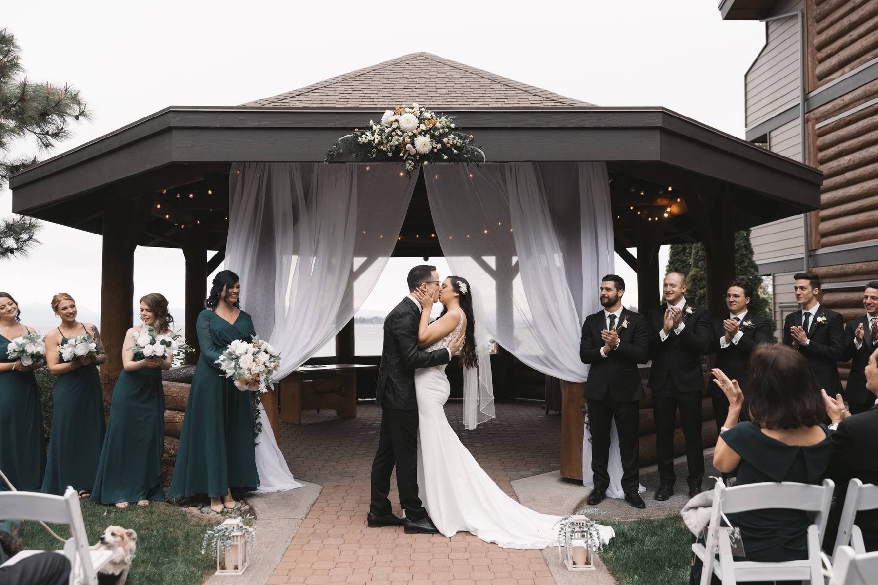 Tigh-Na-Mara Seaside Spa Resort wedding ceremony in Parksville with oceanfront gazebo and couple kissing