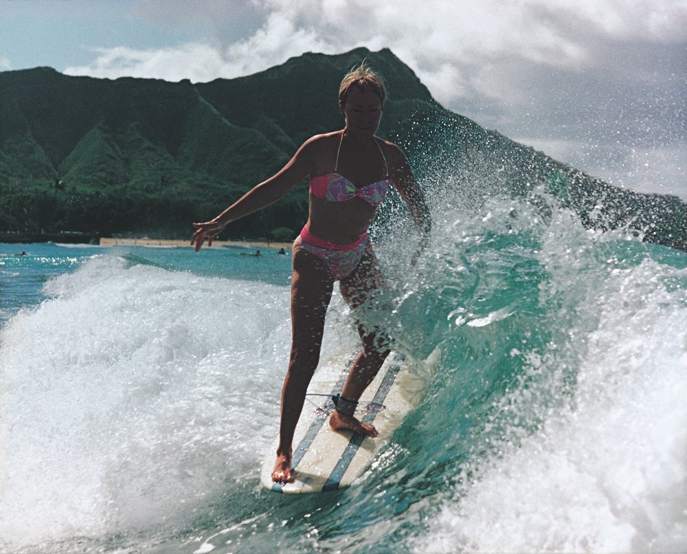  Linda Benson surfing in Hawaii. Photo by Bobby Ah Choy 