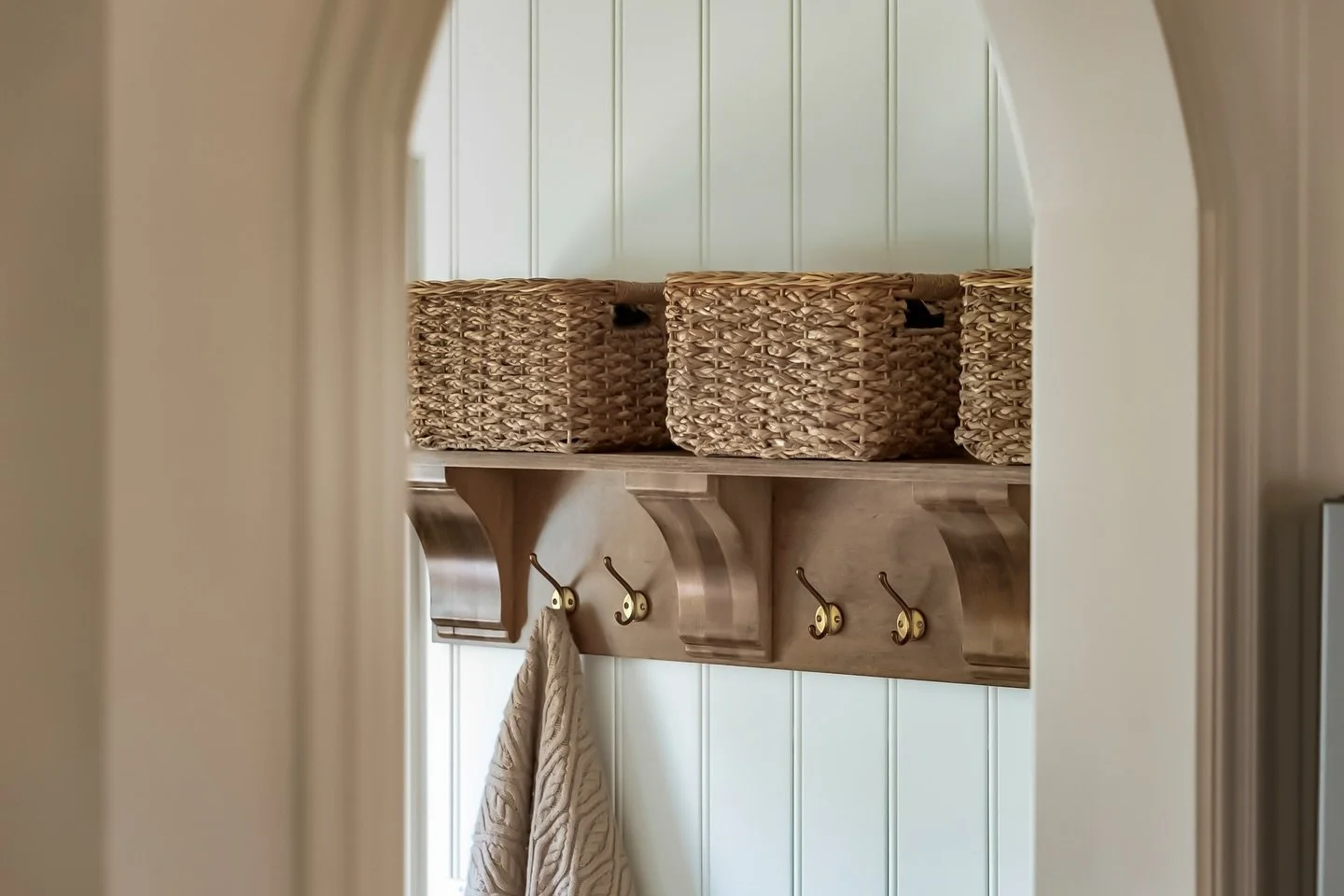 This mudroom is full of timeless charm. This design features a country sink, custom scalloped bench, and brick herringbone floors that will never go out of style.

#RenovatingKC #KansasCityDesignBuild #MudroomMakeover #KCRemodeler #TimelessInteriors 