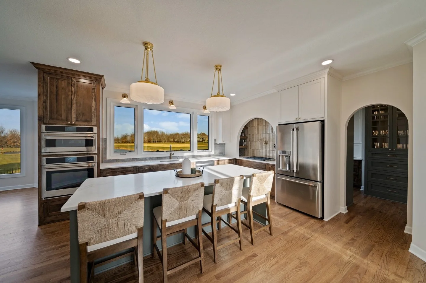 An Overland Park kitchen remodel that checks every box ✨

Arched range hood ✔️
Stacked tile ✔️
Hidden spice rack ✔️
STUNNING finishes ✔️

 From the statement hood to the seamless storage moments, this kitchen is proof that the little things make the 