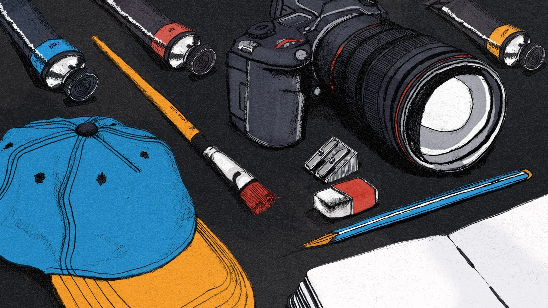 An assortment of objects on a dark surface including a blue and yellow baseball cap, colored pencils, a camera with a large lens, paint tubes, a small pencil sharpener, an eraser, a wooden and a plastic ruler, and a notebook.