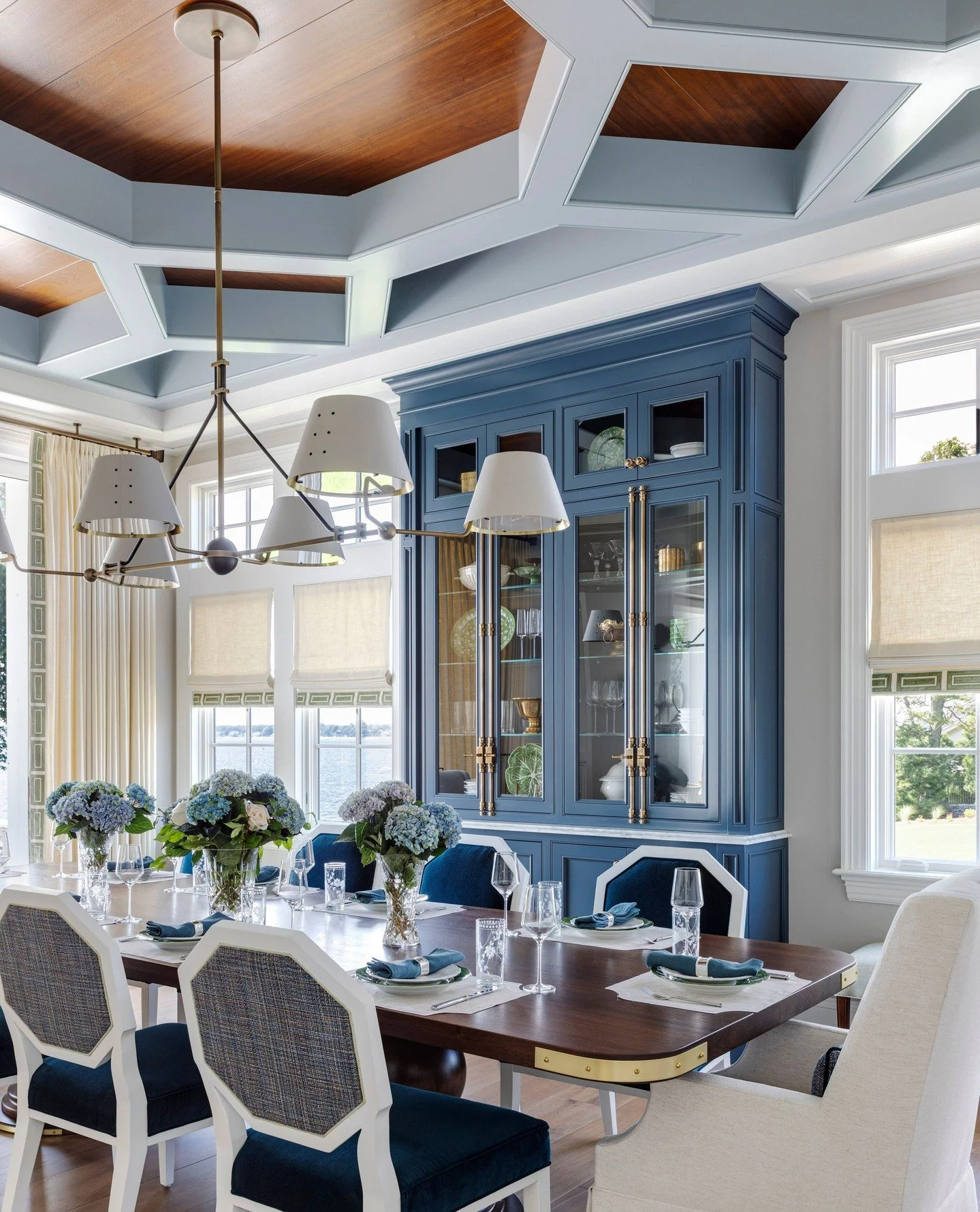 Our clients at Bay View have a love for coffered ceilings, a design preference we happily share. Nearly every room in the home has its own interpretation, but the dining room may be the most distinctive.⁠
⁠
The custom ceiling gives the room its archi