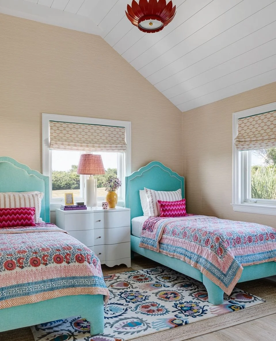 A summer home should feel like a place where the kids get to have a little fun too. For this girl's bedroom, we leaned into playful color and pattern, to create a space that feels joyful without feeling overly themed.⁠
⁠
The goal was to give the girl