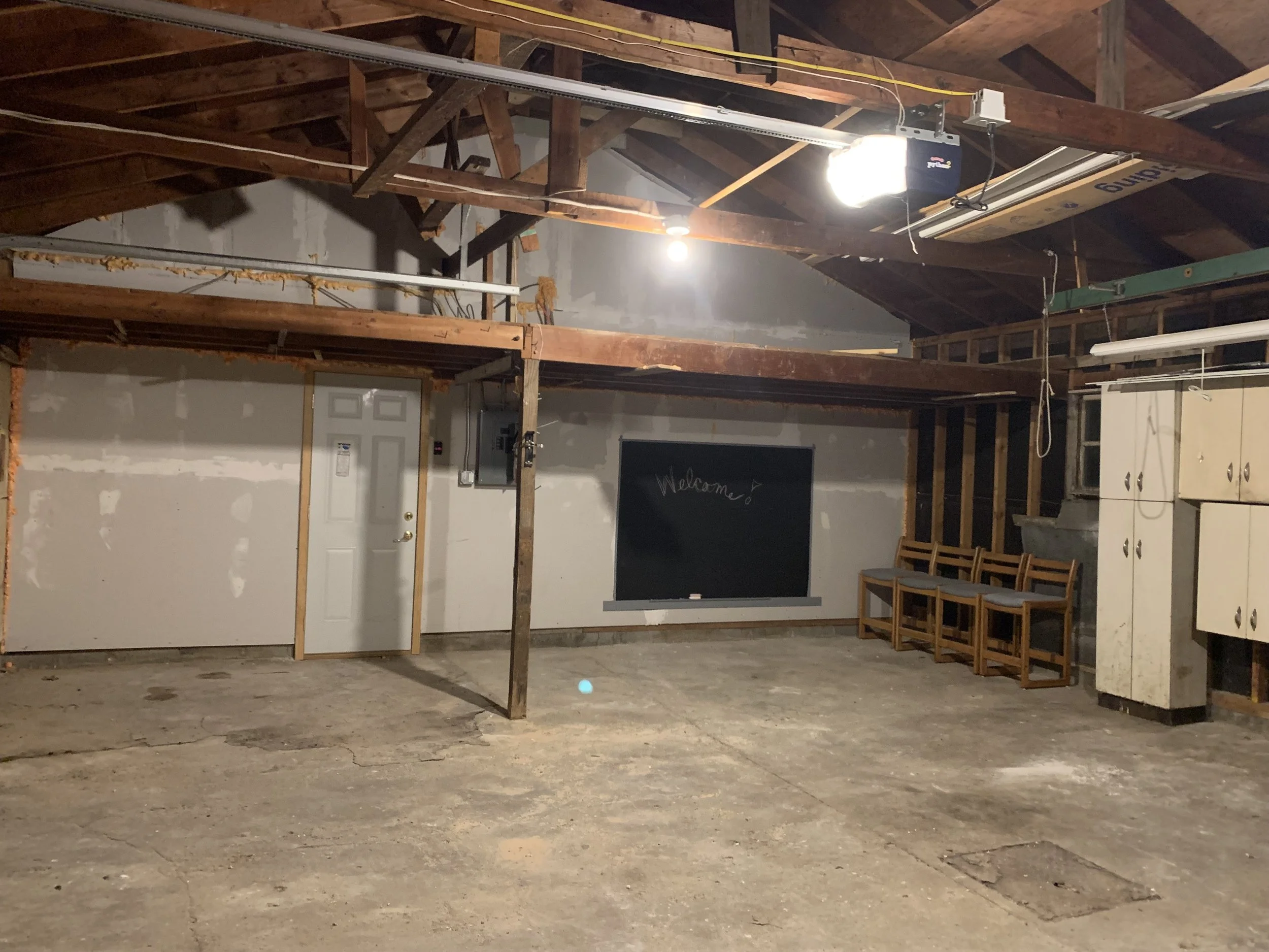 2 1/2 car garage w/ storage loft