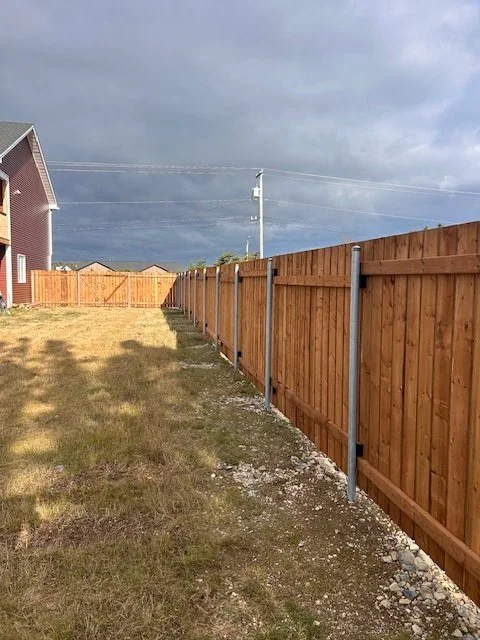 6ft high wood fence on steel posts