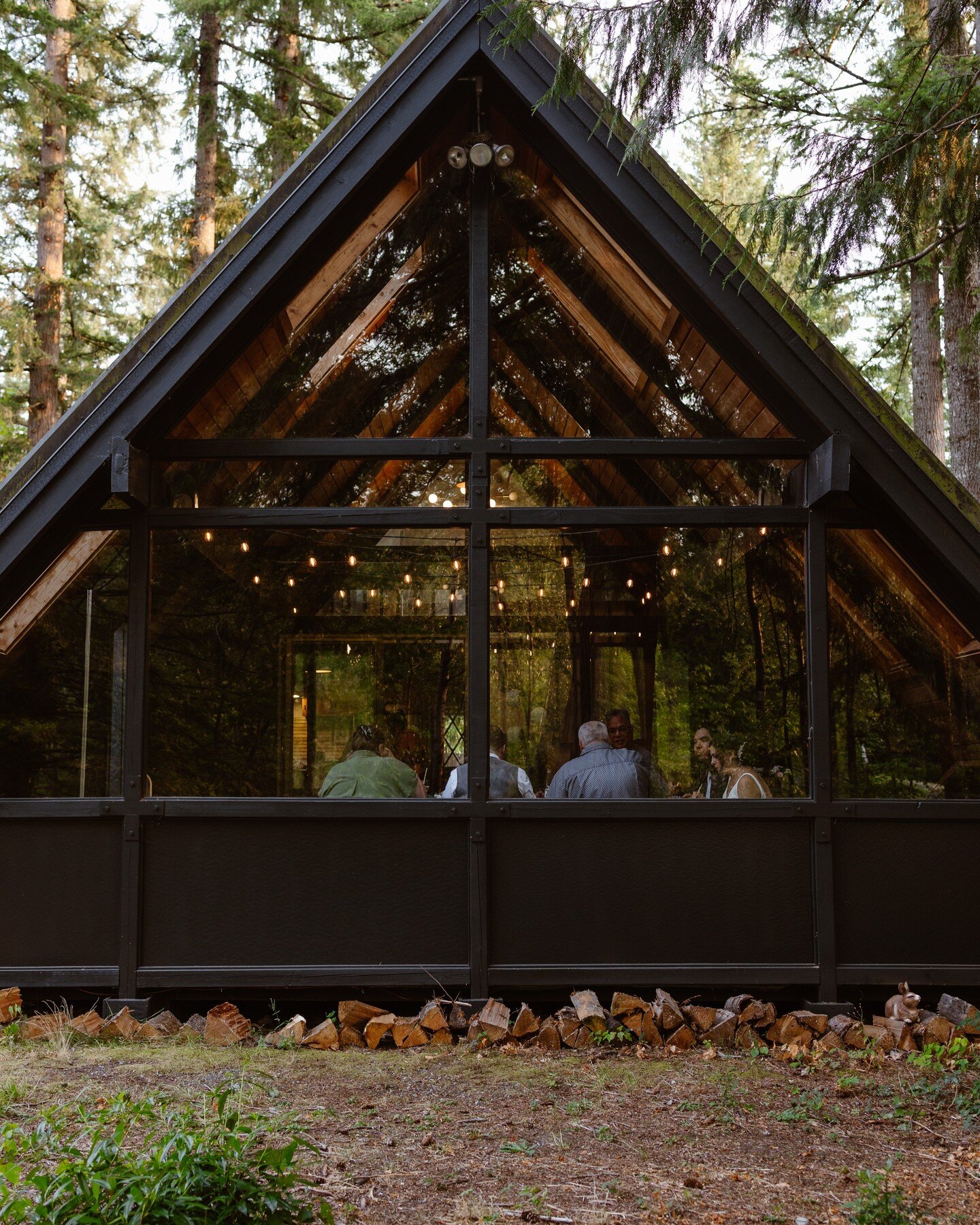 If you're thinking of having a smaller, more intimate wedding, consider finding an AirBnB or VRBO that allows having guests to have your ceremony &amp;/or reception in! There are so many hidden gems like this lovely cabin in the woods where couples a