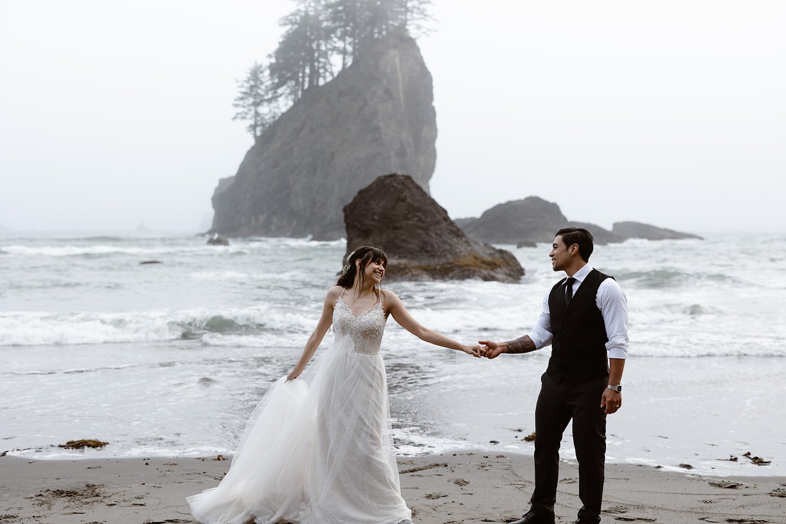 couple dancing on the washington coast for their pacific northwest elopement