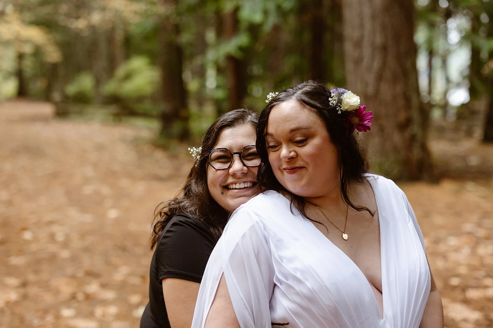 washington couple smiling at each other for their elopement