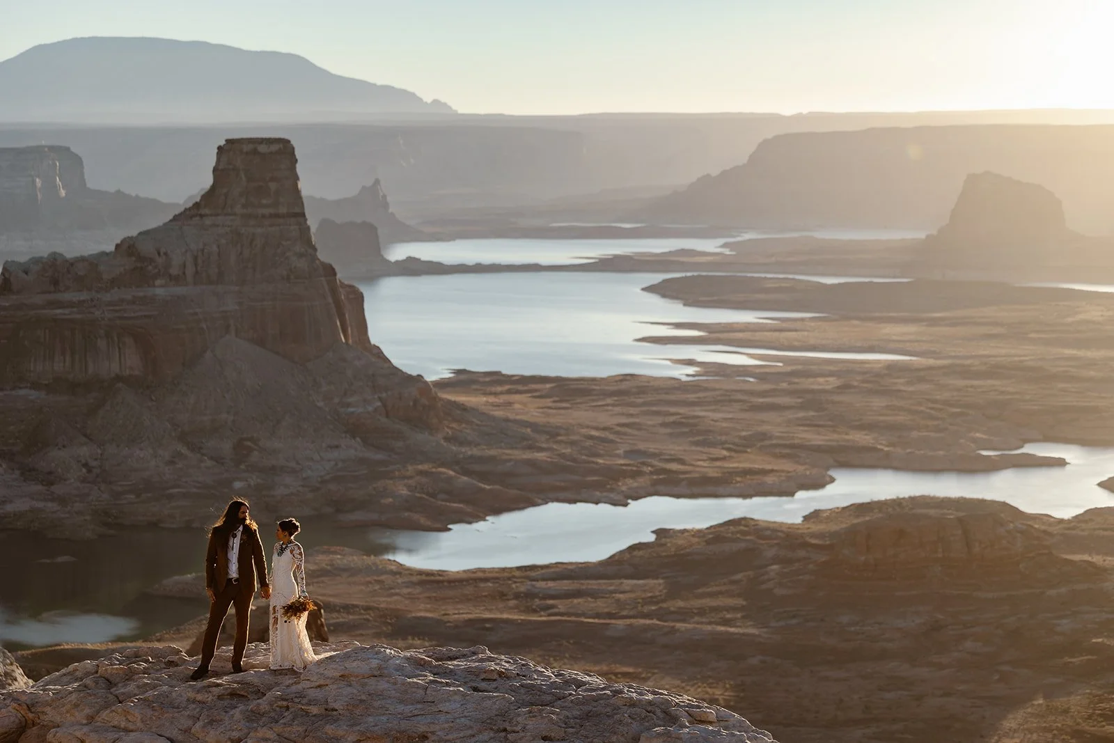 elopement couple looking at each other at lake powell