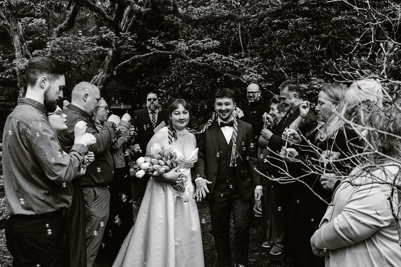 intimate wedding couple smiling after their wedding at the seattle arboretum