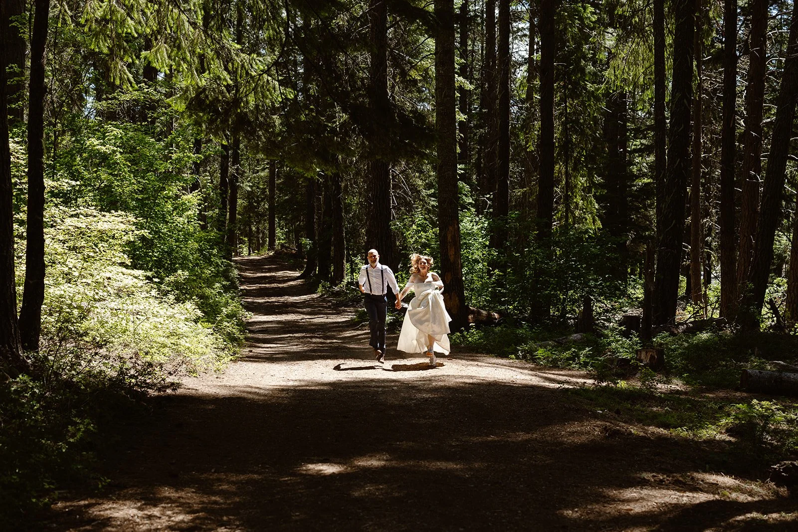 elopement couple skipping during their lake wenatchee elopement