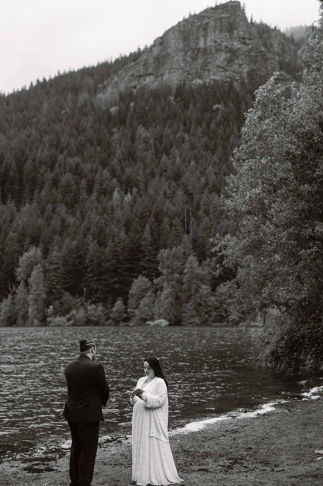 couple reading their vows during their elopement in north bend