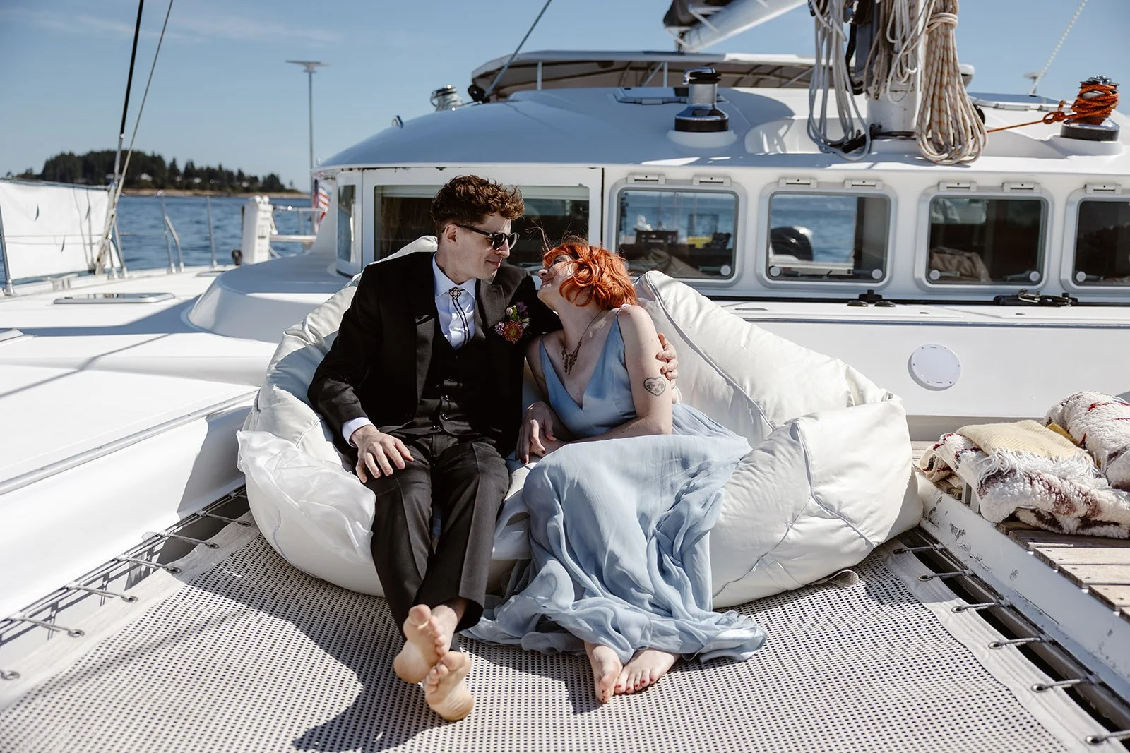 Washington elopement couple smiling during their sailboat elopement