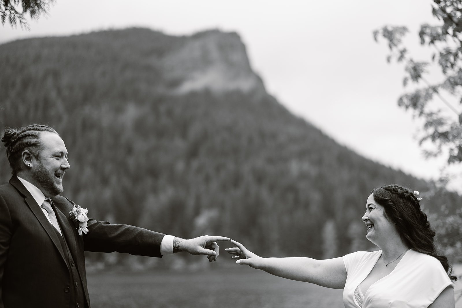 north bend couple smiling for their elopement at rattlesnake lake