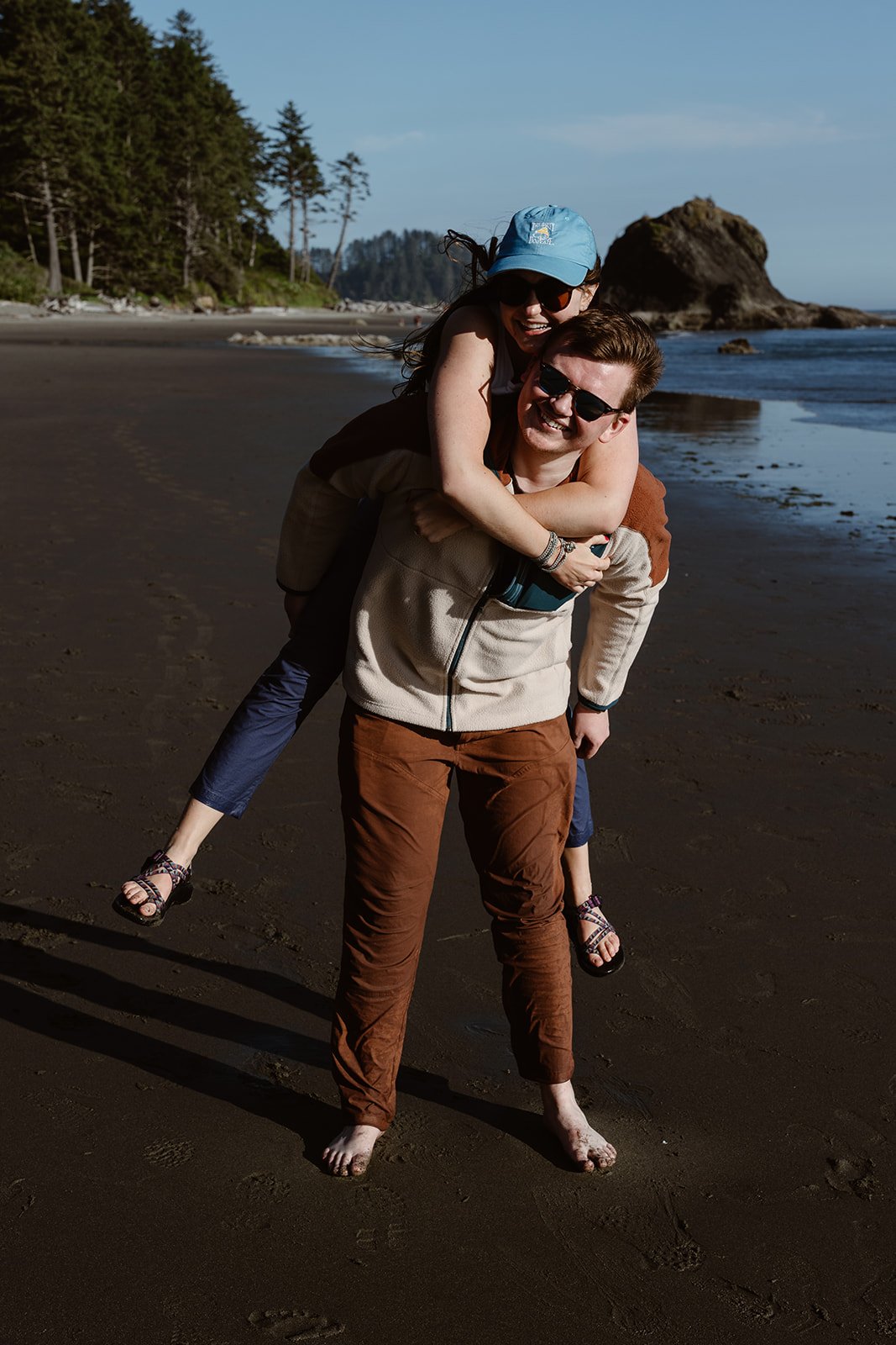 washington couple smiling with their dog after eloping