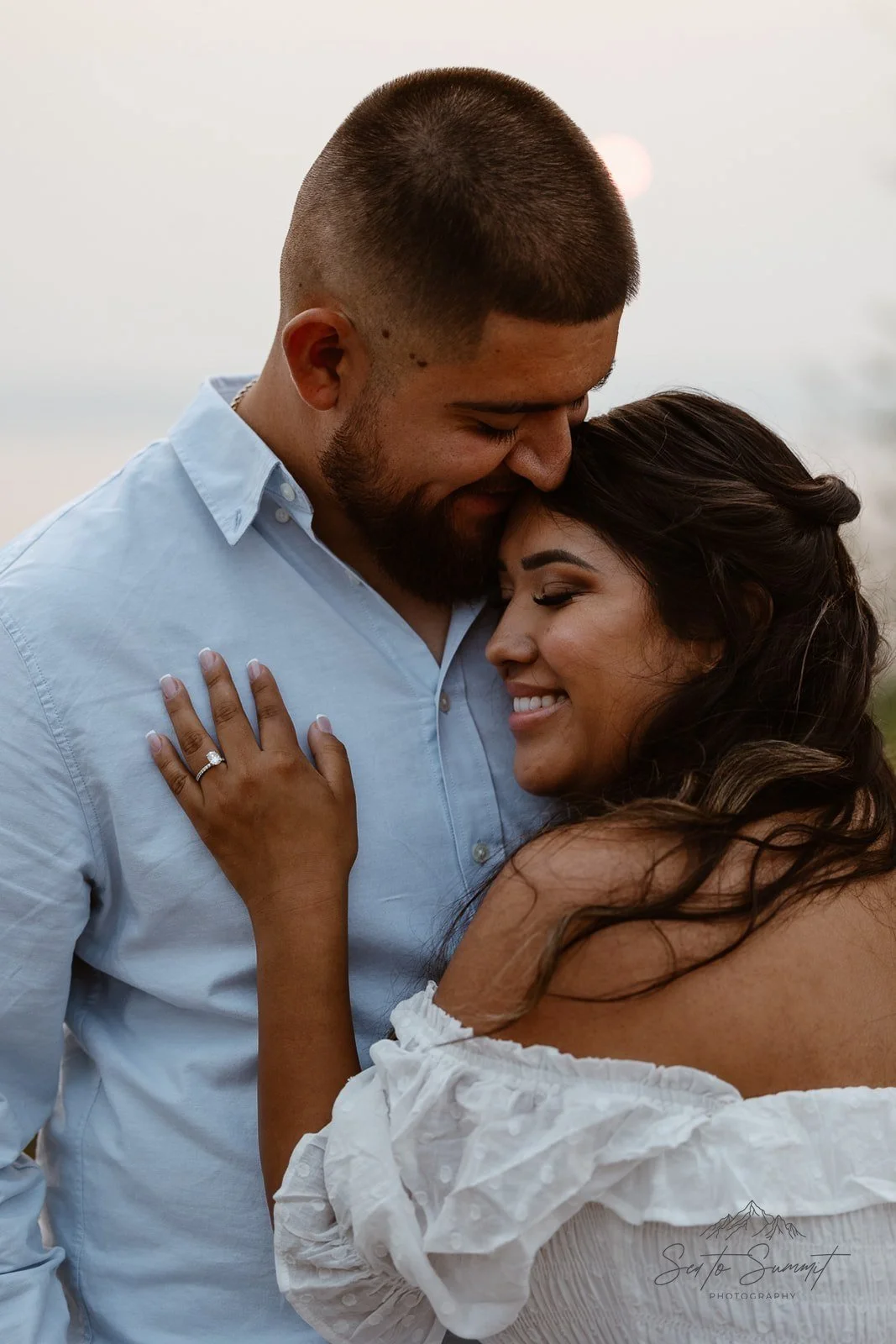 Couple smiling during their Discovery Park Seattle elopement