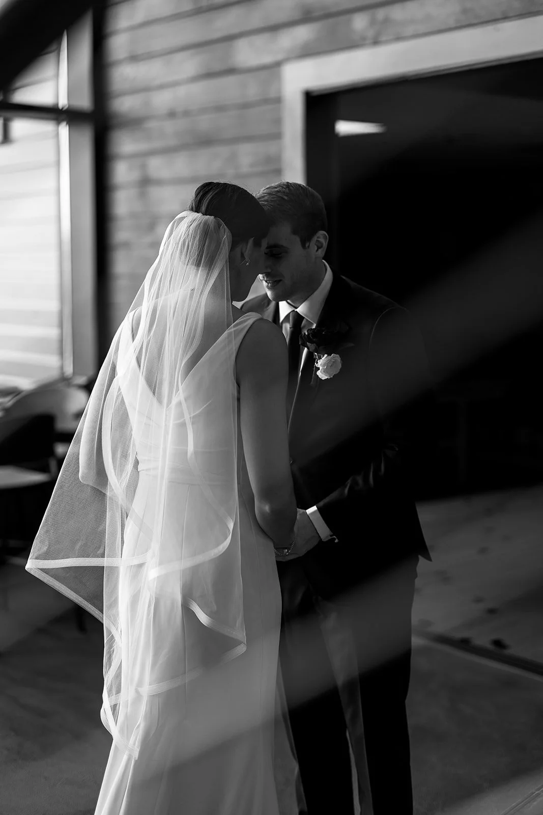 couple looking at each other during their Washington wedding in Mukilteo