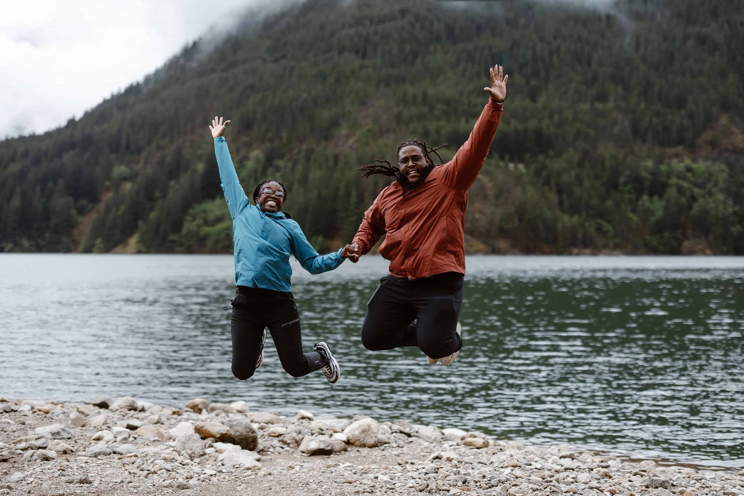 couple smiling at each other after eloping at olympic national park