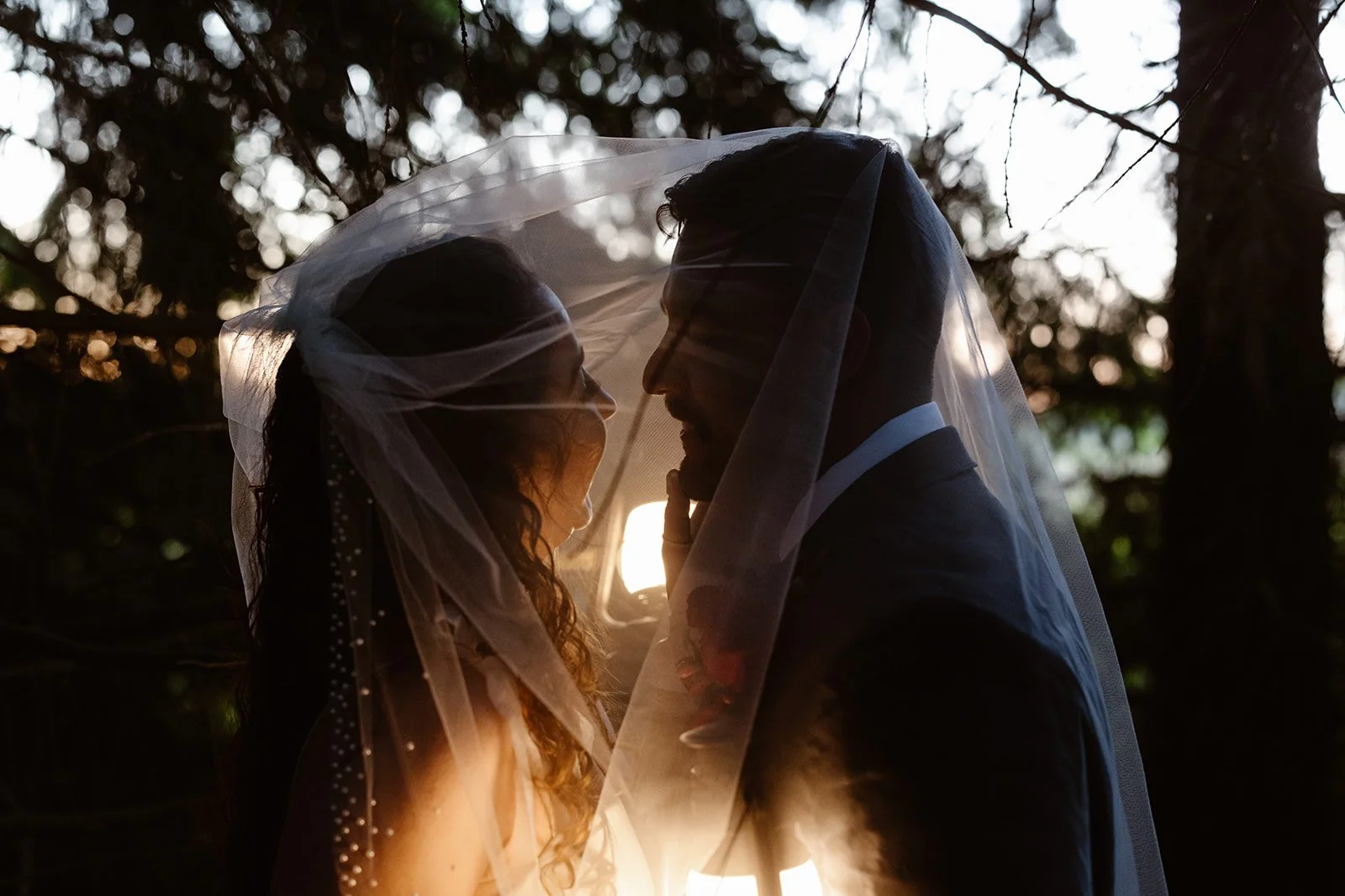 wedding couple smiling during sunset for their micro wedding