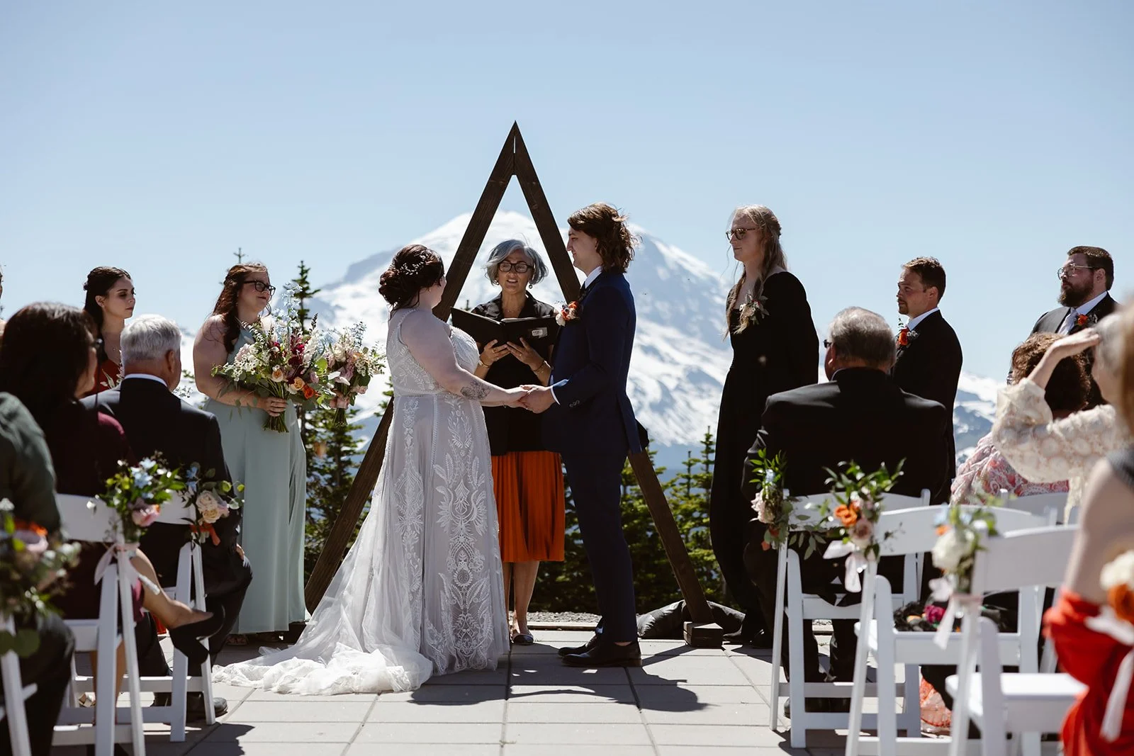 wedding couple saying their vows during their ceremony for their mountain wedding at Mount Rainier
