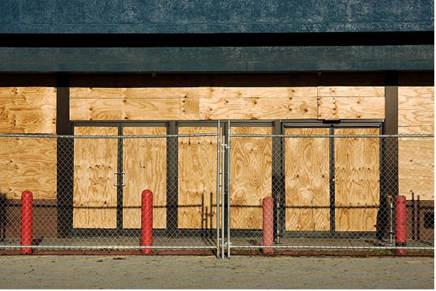 damaged business boarded up