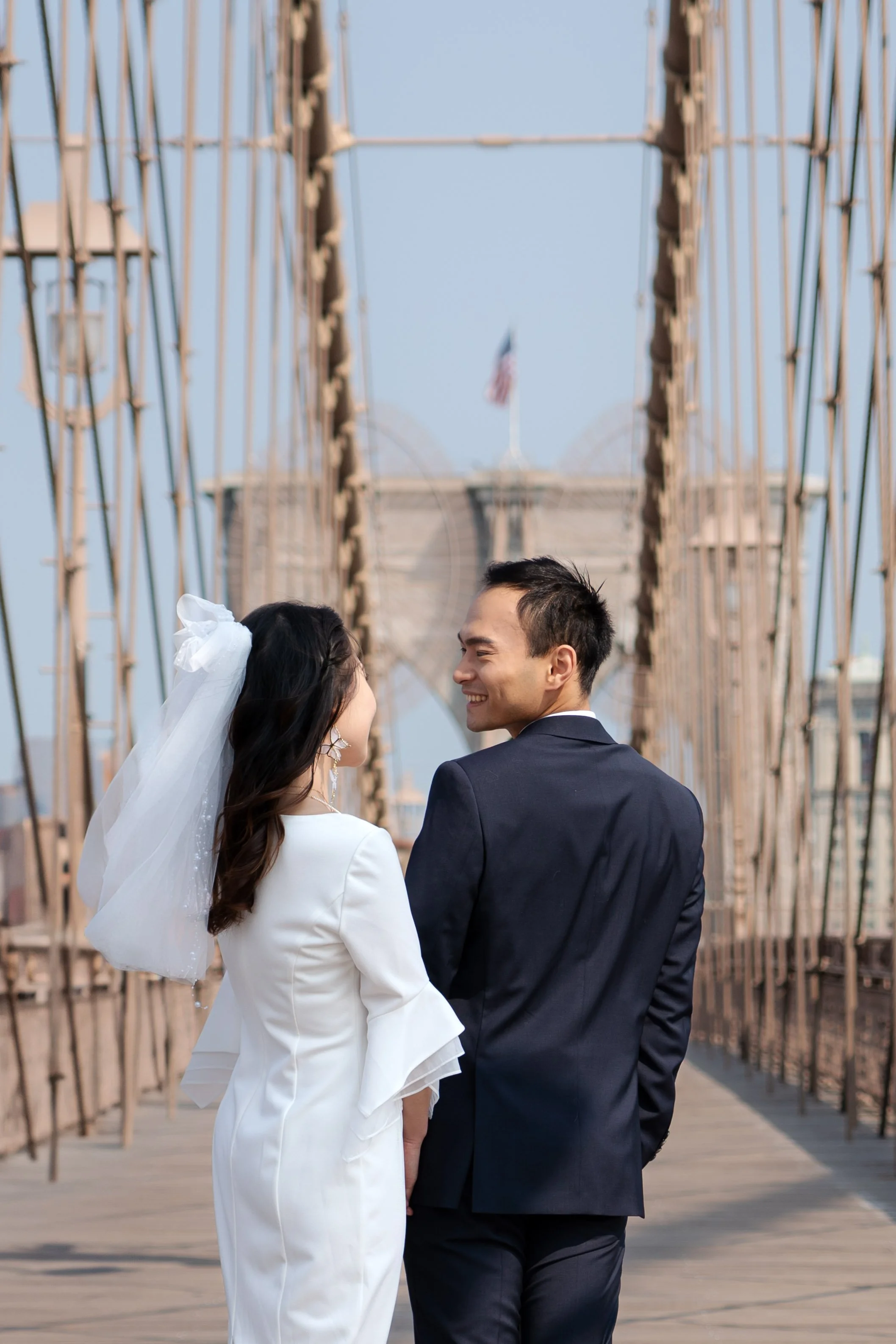 Newlywed eloping couple portraits on the Brooklyn Bridge
