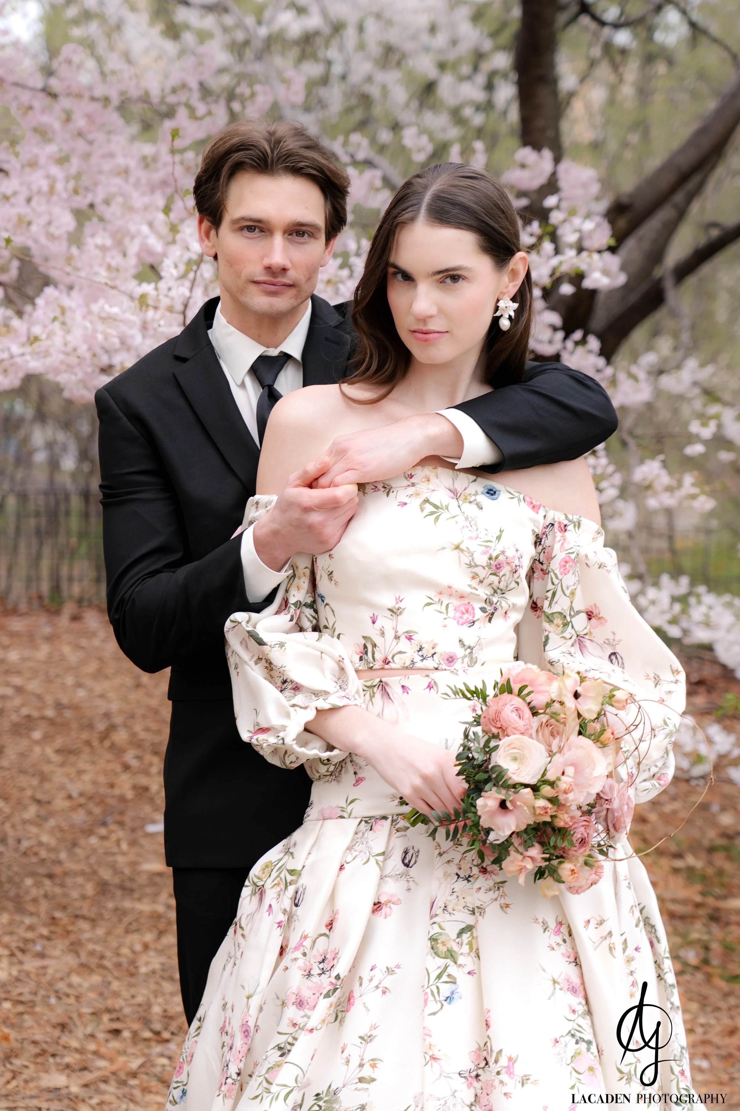 cherry blossom engagement portrait in Central Park by Lacaden Photography