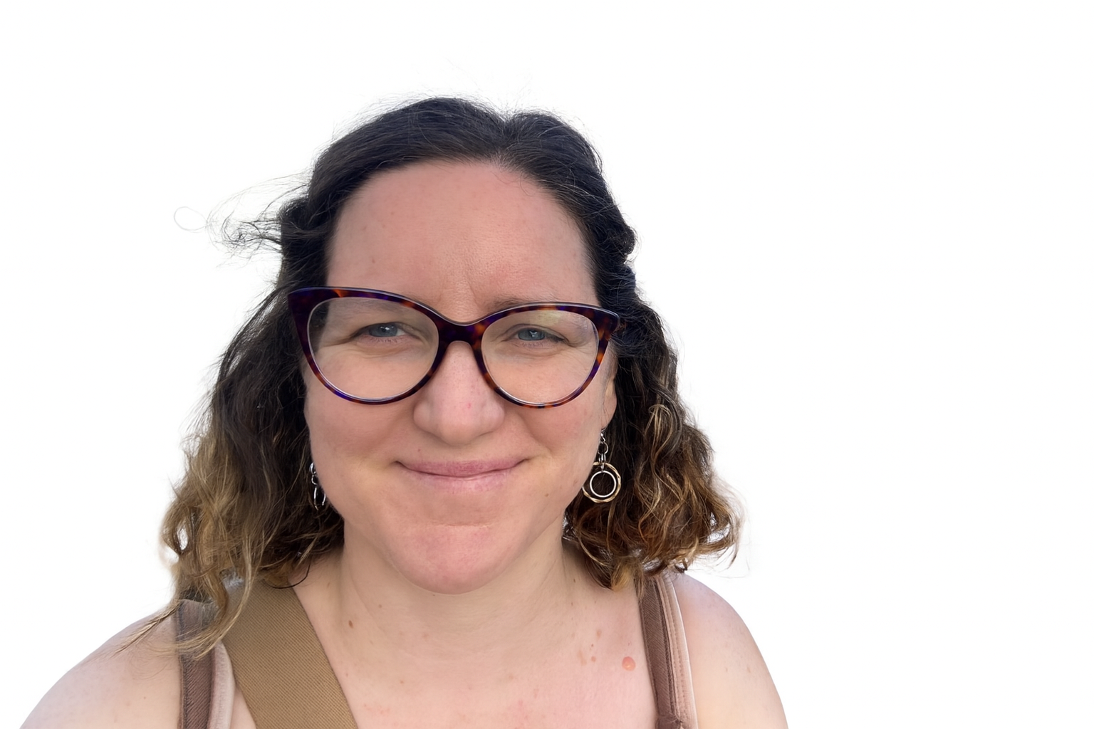 Headshot of Holly Law who has shoulder length brown hair and is wearing glasses.