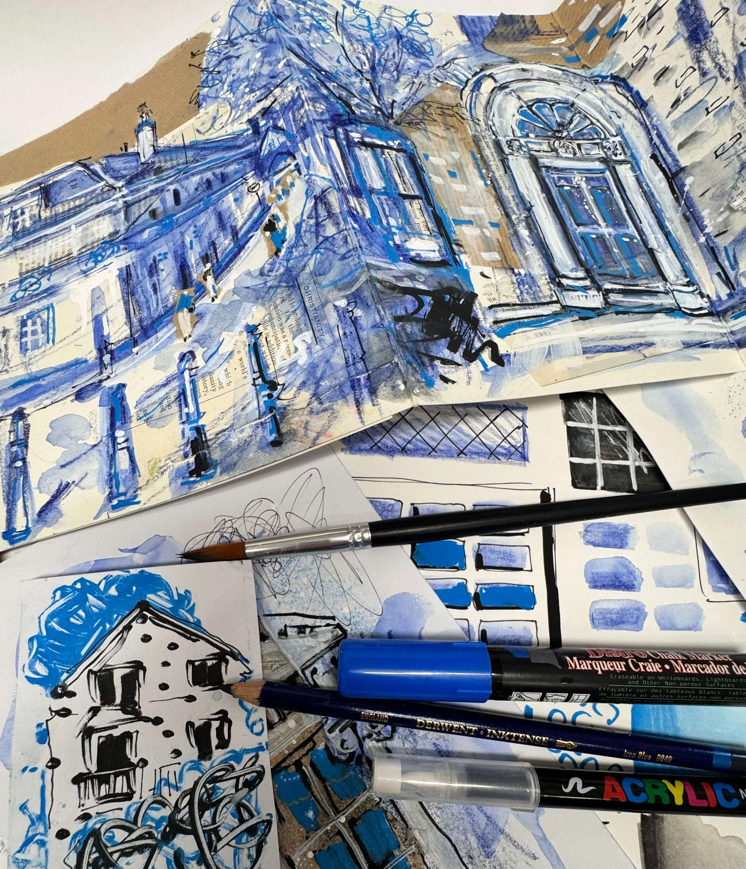 mixed media sketches in blue white and black of urban scenes inWnchester