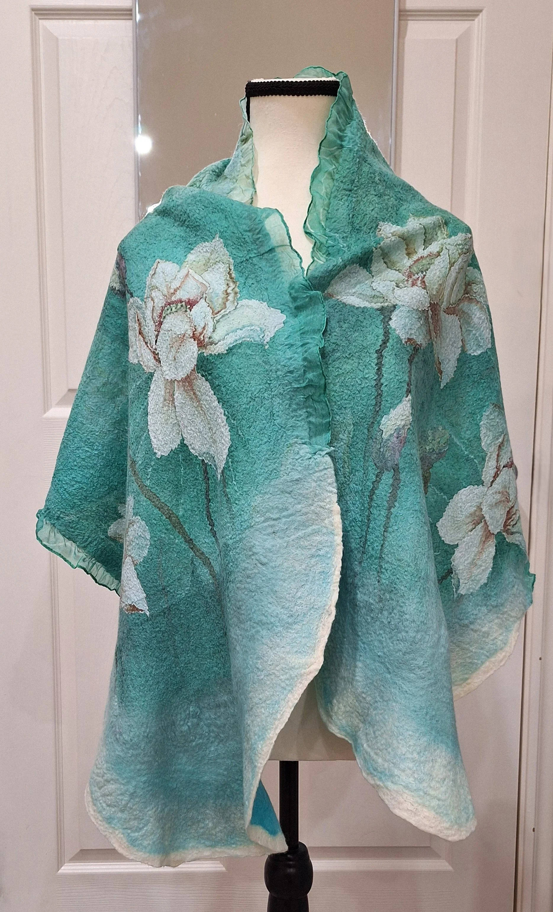 Larissa Sokolova - Fiber Artist |  "Wearable Art". 
Larissa uses wet felting in her work. All crafted with environmentally friendly fibers such as wool, silk, linen, bamboo, etc.  Unique handmade products that are wearable, comfortable, and bring joy