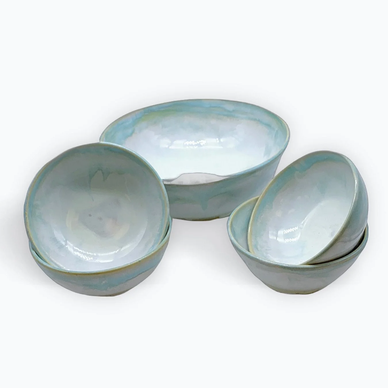 Sue Steele with Jann Smith - Potter | Sue Steele and Jann Smith, two passionate members of the Riverbank Pottery Studio, find constant challenge and excitement in their artistic growth. Jann particularly loves experimenting with a wide range of glaze