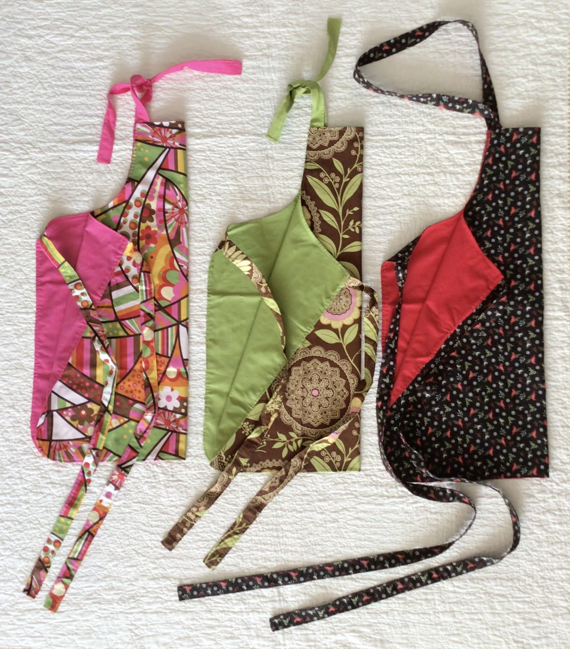 Sylvia Shackles - Fabric Artist | Sylvia is known for her charming and colourful quilts. She selects interesting and vibrant fabric patterns to create eye-catching designs, blending artistry with functionality. Each of Sylvia's quilts is thoughtfully