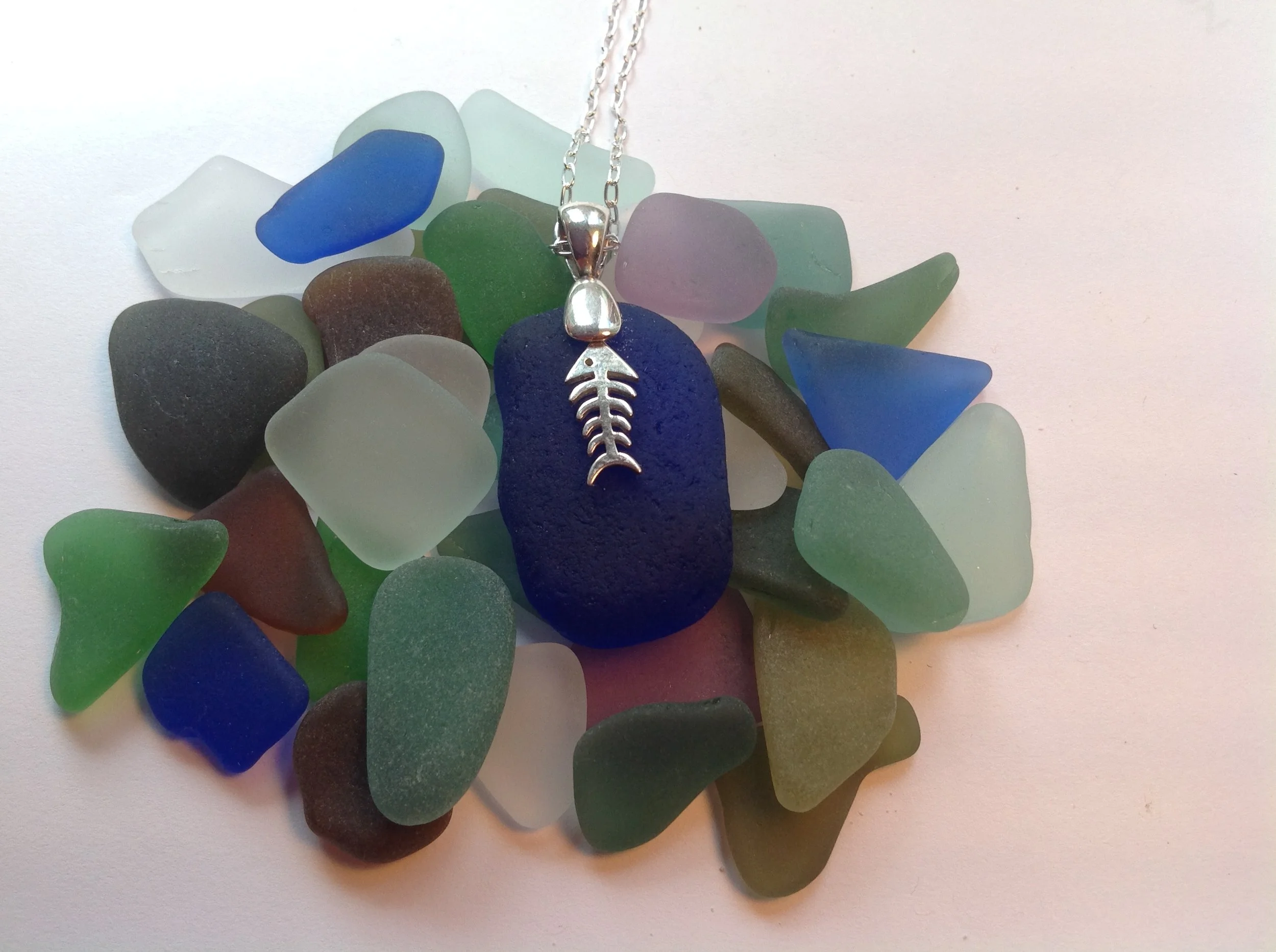 John and Brigitte Irwin, sea glass jewelry | Genuine ocean tumbled sea glass can be found on many beaches around the world.  John and Brigitte have been collecting for more than 30 years from the east coast of Canada to the Bahamas and beyond.  The g
