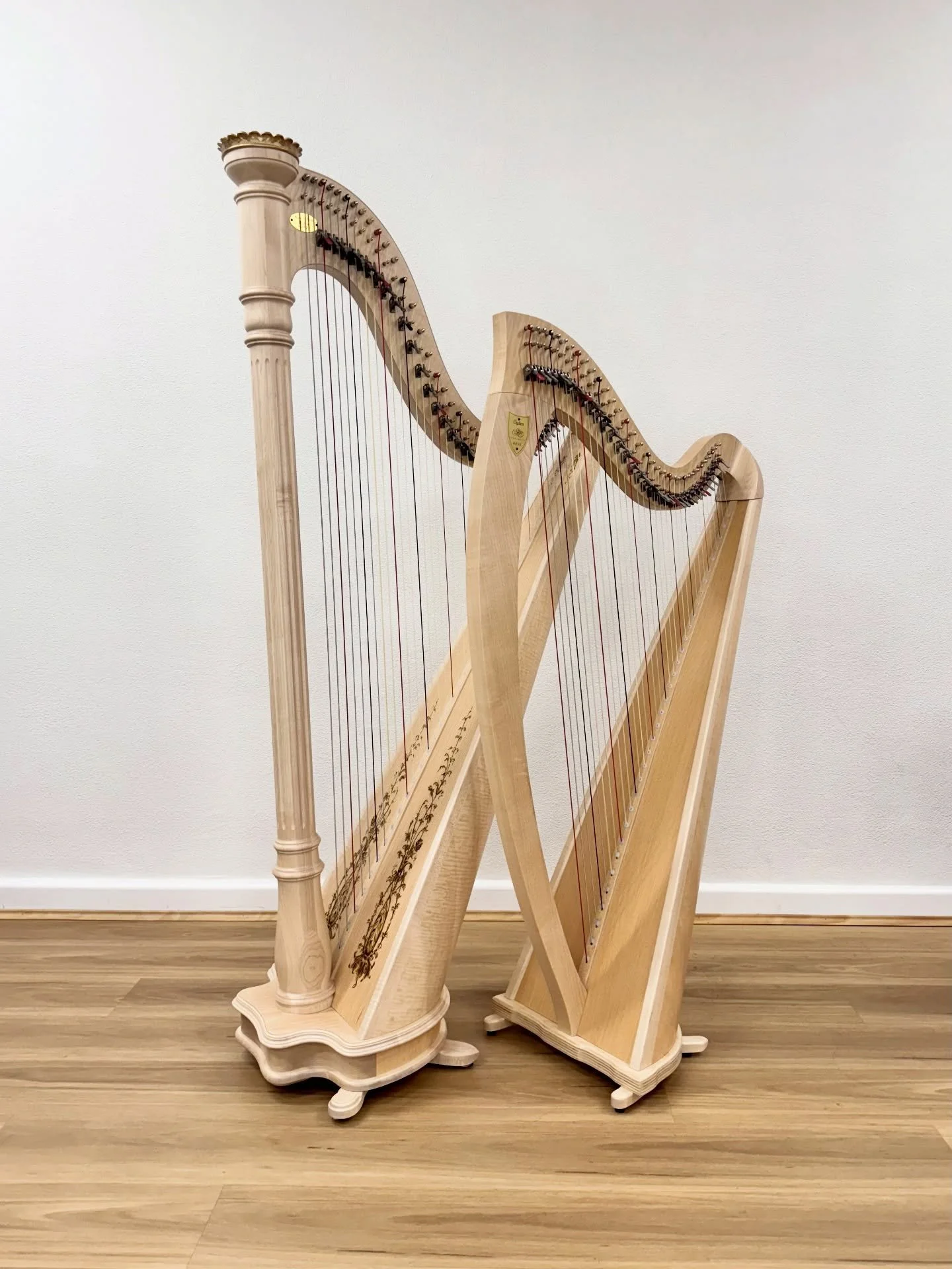 Two of Lyon &amp; Healy&rsquo;s most popular lever harps: Prelude (40 strings) and Ogden (34 strings) in natural finish. 

These harps are designed to use pedal gut, pedal nylon, and pedal wire strings. The string tension is similar to that of a peda