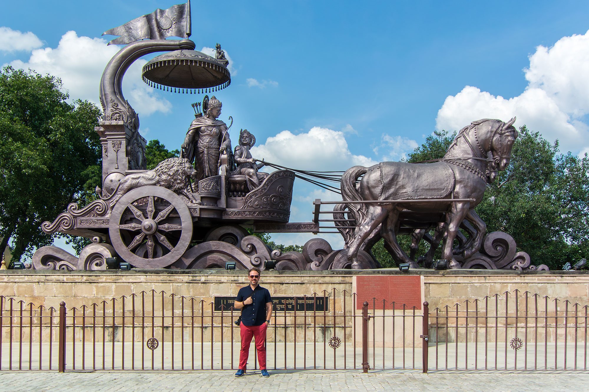 Sculpture of Arjuna and Krishna at Kurukshetra, India, where the epic battled depicted in the Bhagavad Gita is said to have taken place.