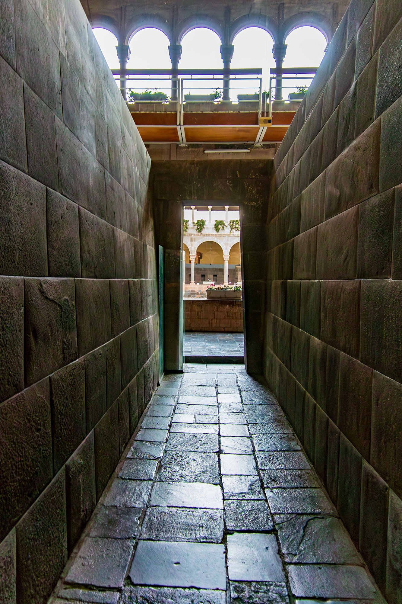Qorikancha in Cusco, Peru. Spanish conquistadors build their own Santo Domingo Convent on top of the foundation of the original Inca temple, much of which was destroyed during the war in the 16th century. Here you can see the original ashlar masonry