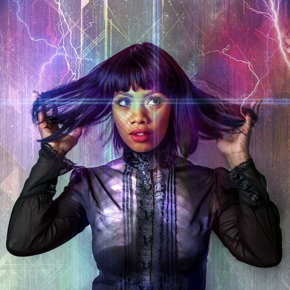 Keisha Howard with purple hair and a black blouse holding her hair in both hands, with a colorful, digital lightning background.