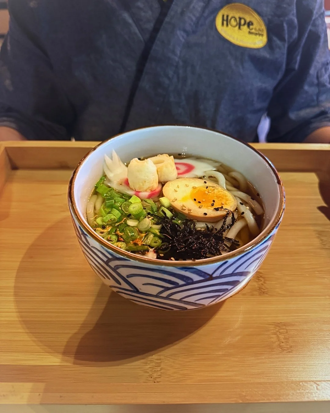 A warm bowl of udon on a wooden tray &mdash; fresh toppings and a gentle teriyaki soup for a rainy day. 🥰

#HopeIzakaya #edinburghfood #japanesefood  #udon #comfortfood #newtownedinburgh #ramenhouse #japanesefooduk