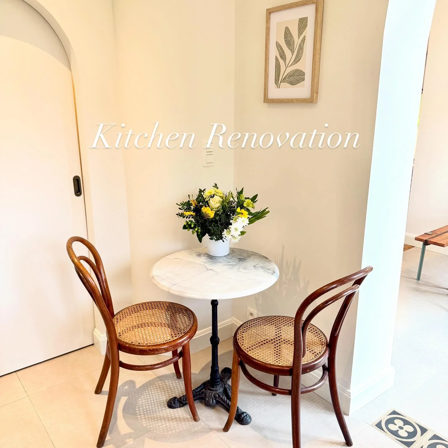 We turned a former doctor&rsquo;s office into a home kitchen with Art Deco inspiration, to stay true to the old building construction style.
The space features solid wood cabinet doors, a ceramic countertop, and a vintage marble table with secondhand